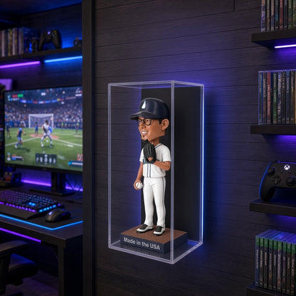 Bobblehead case lit on a wall in a neon game room