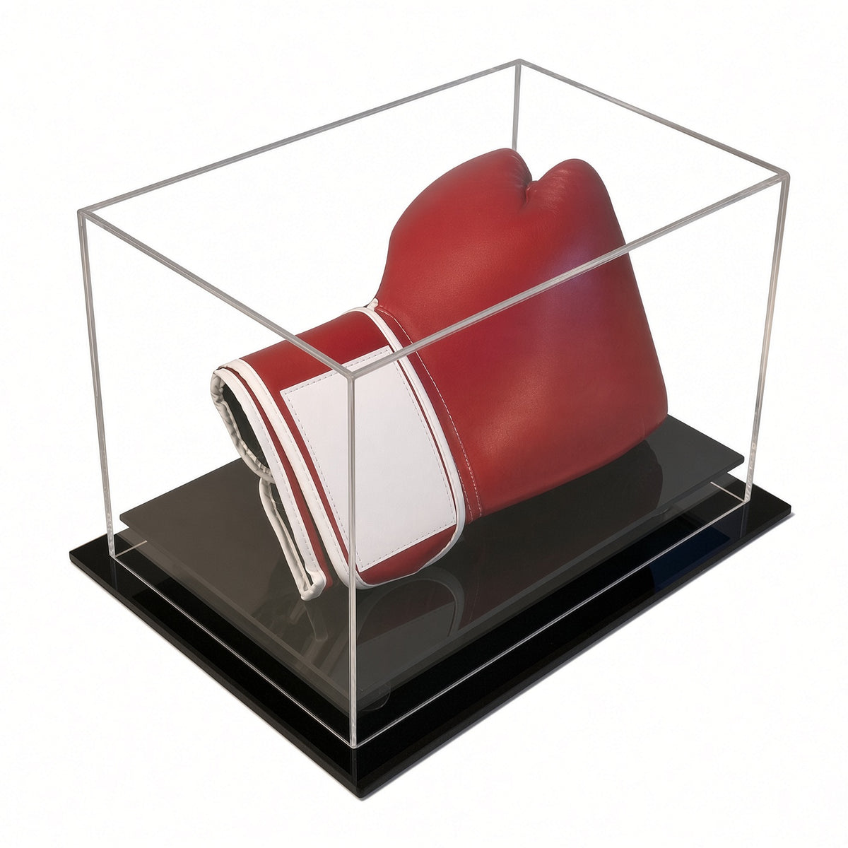 Angled view of a red boxing glove in the table top case