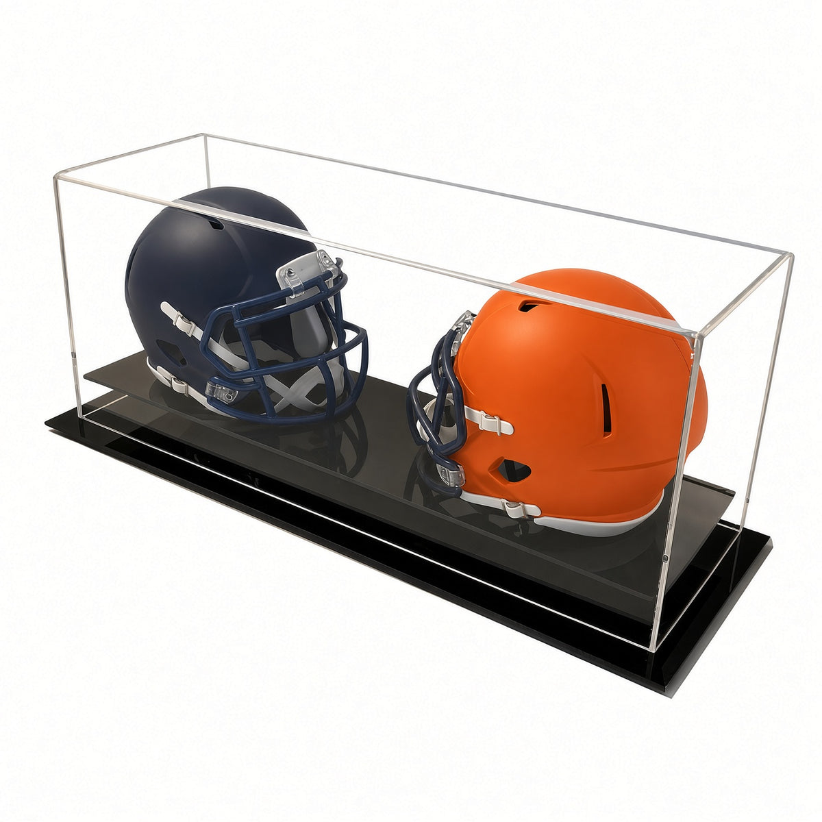 Angled view of two mini helmets in the table top case