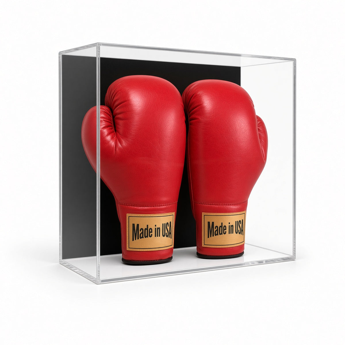 Front view of two red boxing gloves in the case
