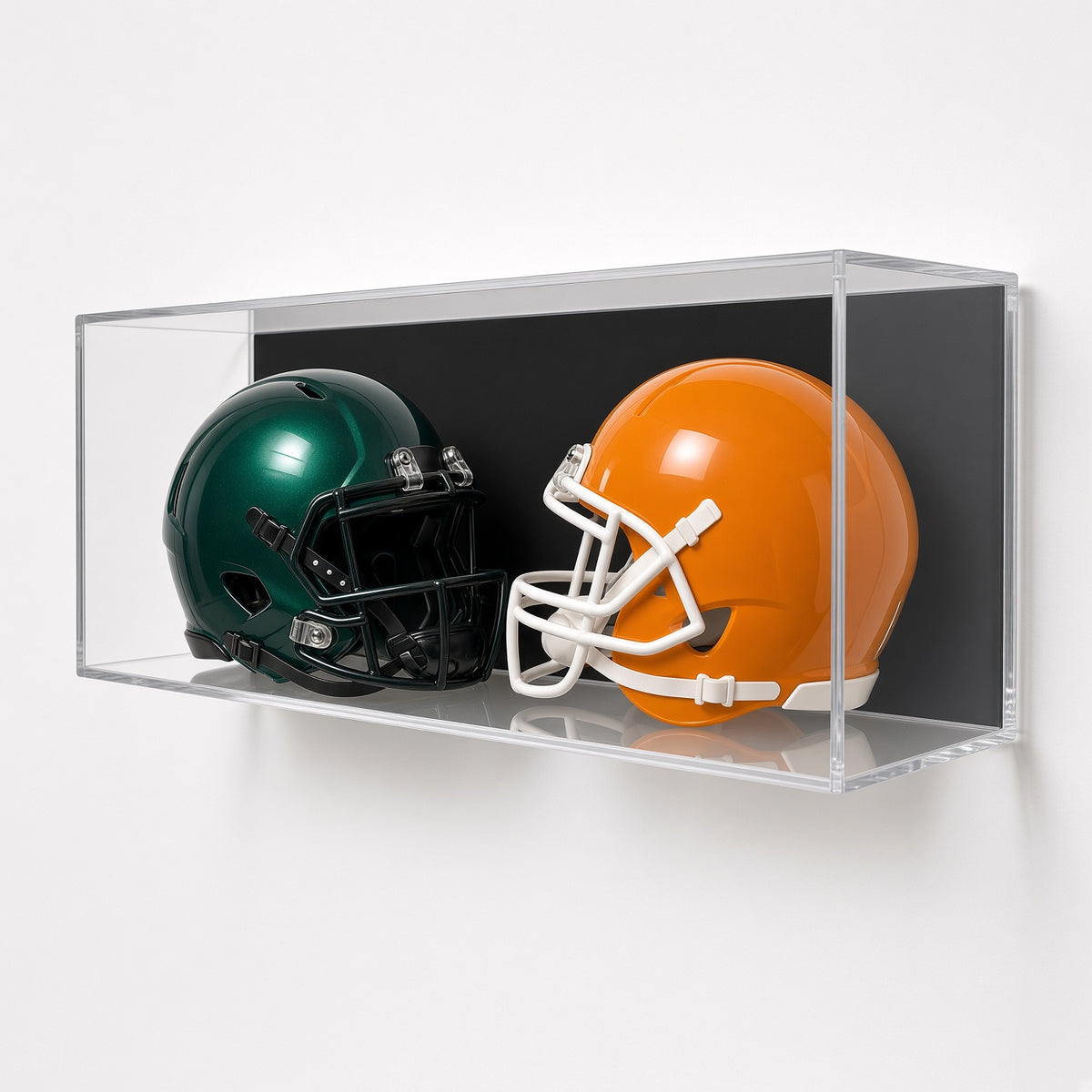 Front view of two mini helmets side by side in the case