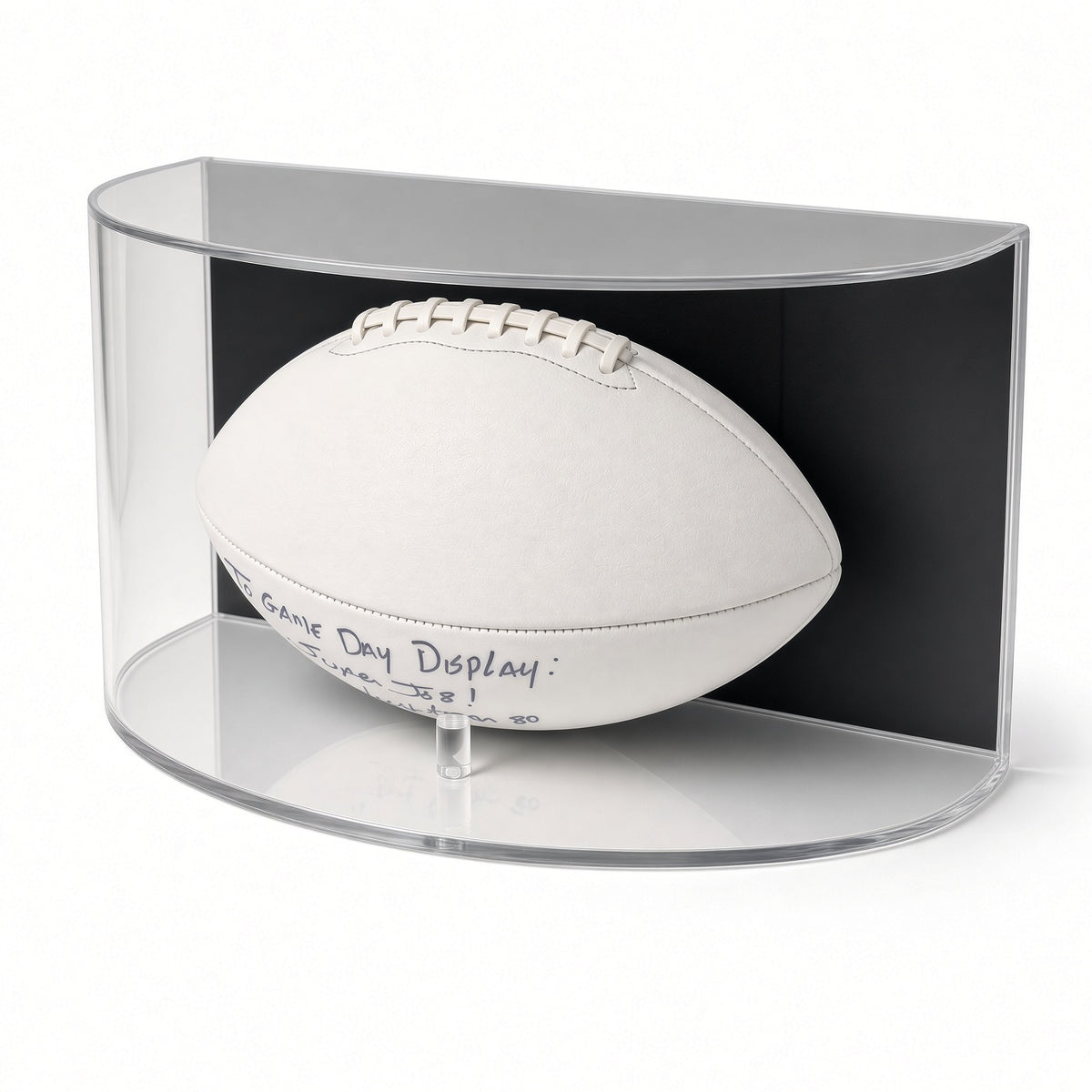 Football displayed in the curved case, shown from a low angle