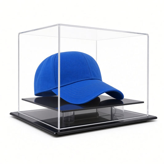 Table top acrylic case with a black base holding a blue baseball cap