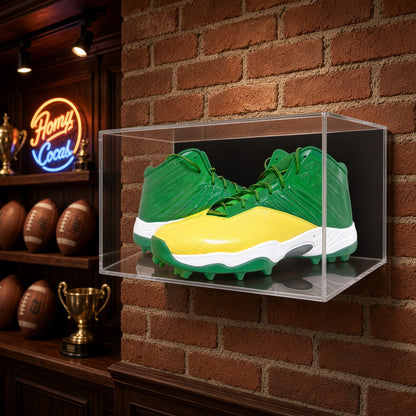 Large shoe pair case on a brick wall above a trophy shelf