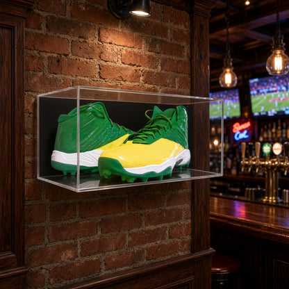 Large shoe pair case on a brick wall in a sports bar