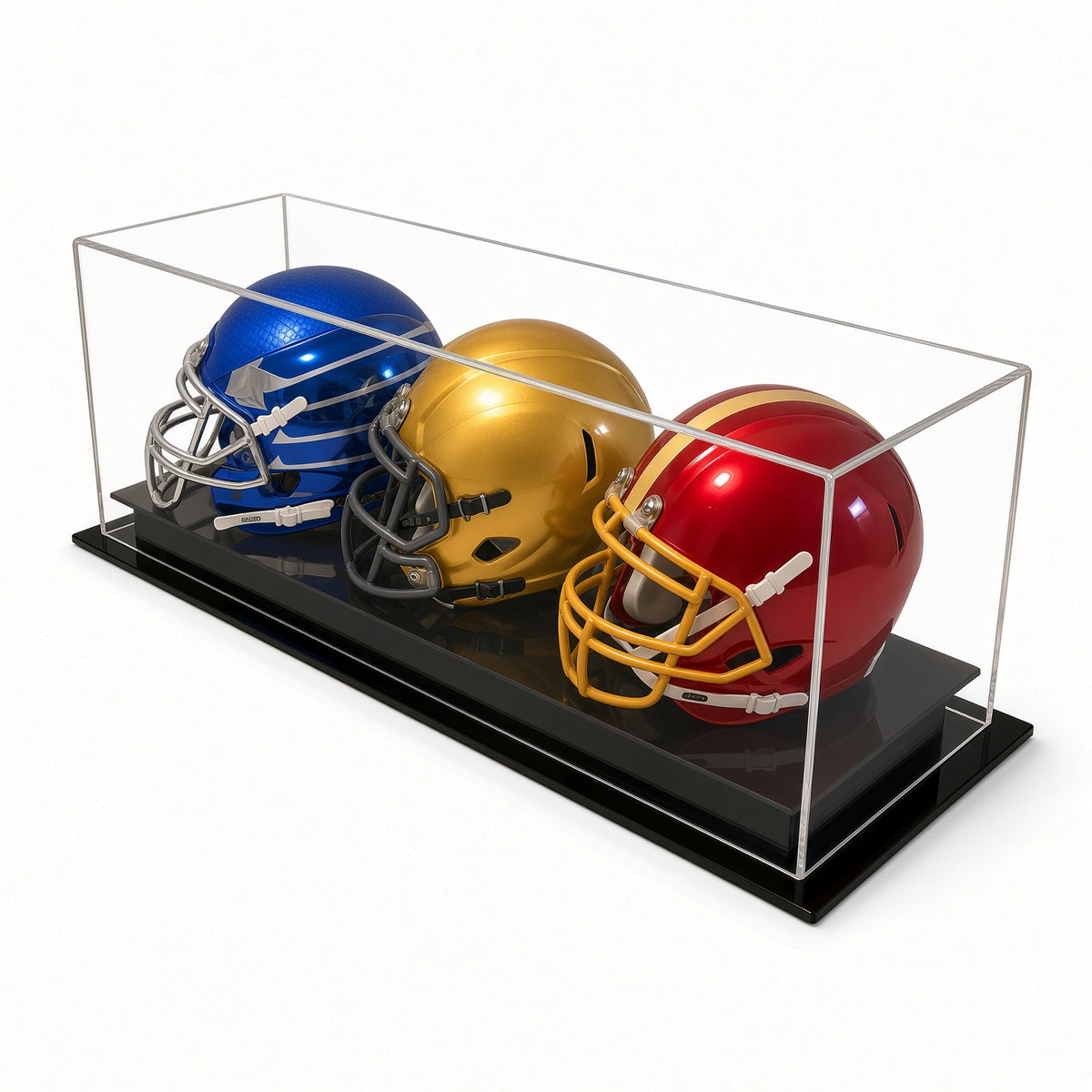Angled view of three mini helmets in the table top case