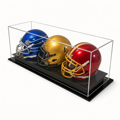 Angled view of three mini helmets in the table top case