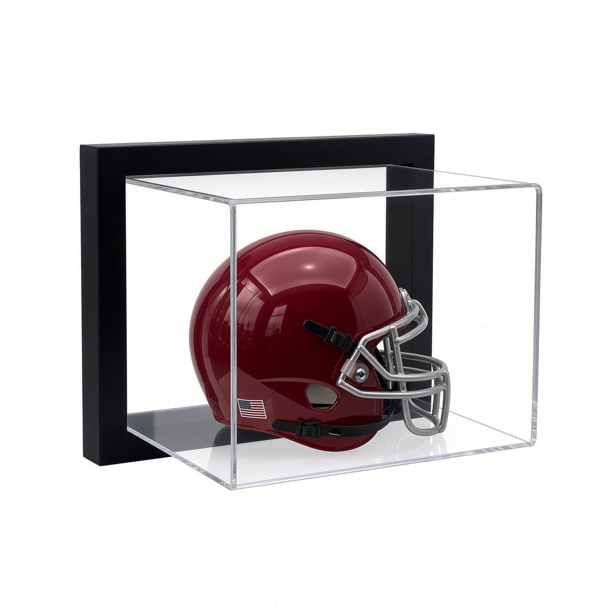 Front view of a mini helmet inside the framed case