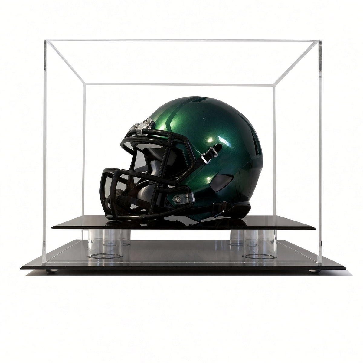 Table top acrylic case with a black base holding a green mini football helmet
