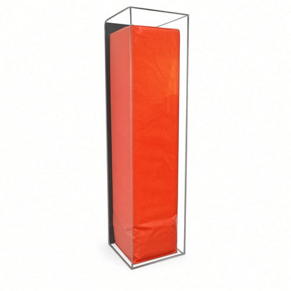 Angled view of the orange pylon in the wall mount case