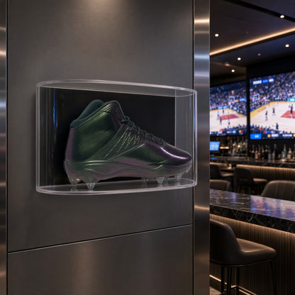 Curved large shoe case mounted on a gray wall in a sports bar