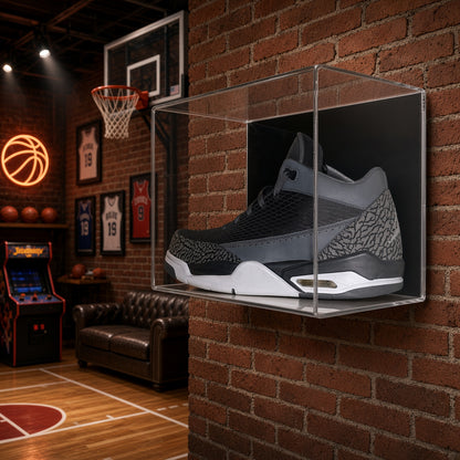 Small shoe case on a brick wall in a home basketball room