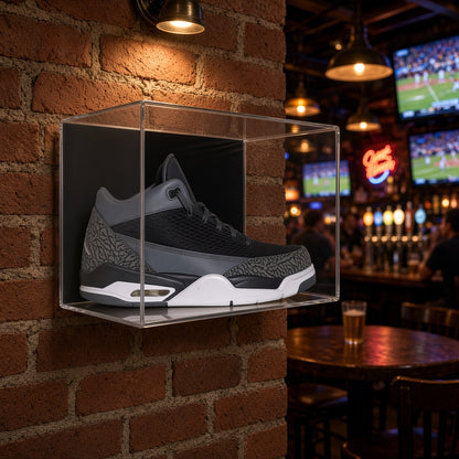 Small shoe case on a brick wall in a sports bar