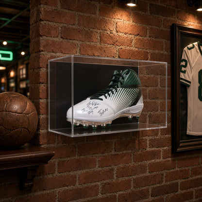 Large shoe case on a brick wall in a sports den