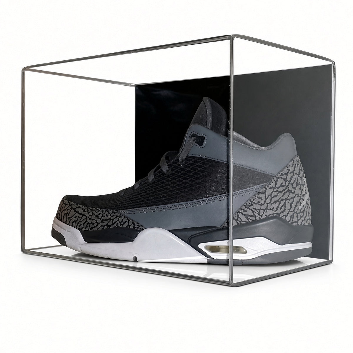 Angled view of a sneaker in the small shoe case
