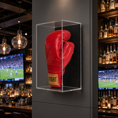 Vertical boxing glove case on a wall in a sports bar