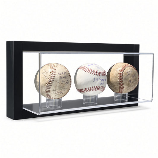 Black-framed acrylic wall mount display case holding three signed baseballs