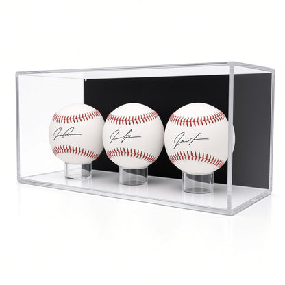 Front view of three signed baseballs on rings in the case