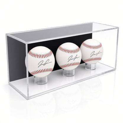 Angled view of three signed baseballs in the wall mount case