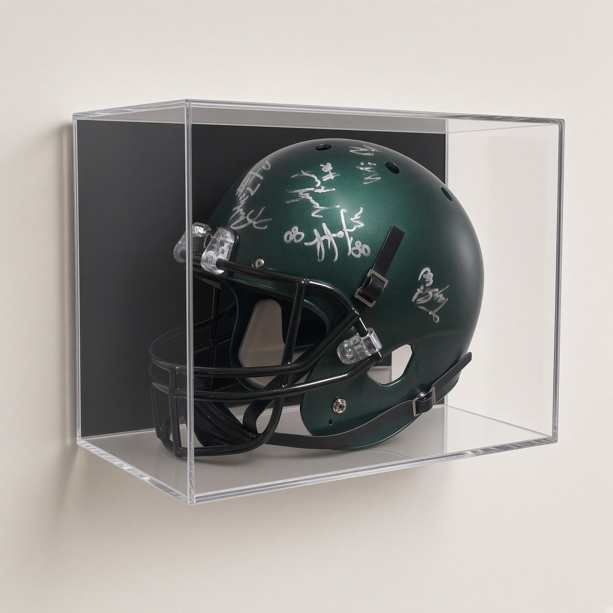 Football helmet display case mounted on a plain beige wall