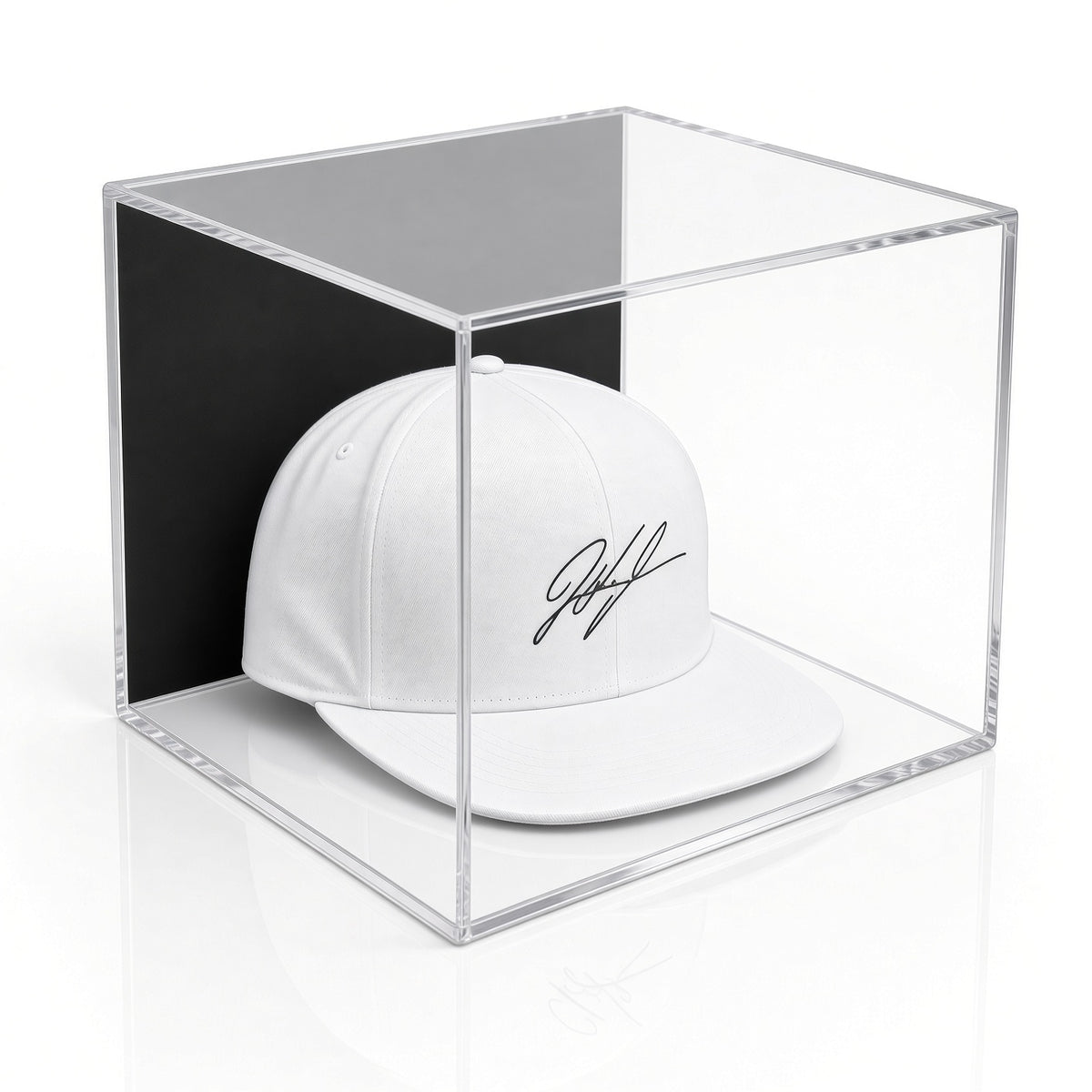 Angled view of a signed white cap in the wall mount hat case